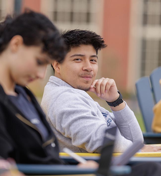 Student sitting outside