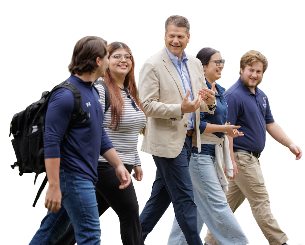 President Edmonds walking with students