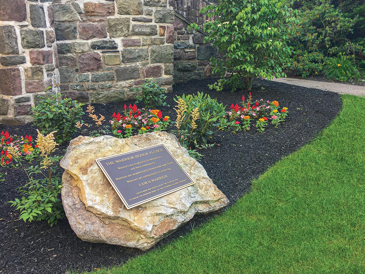 Warrior Pledge Plaque just below the Flag Court on the Fultz Quadrangle