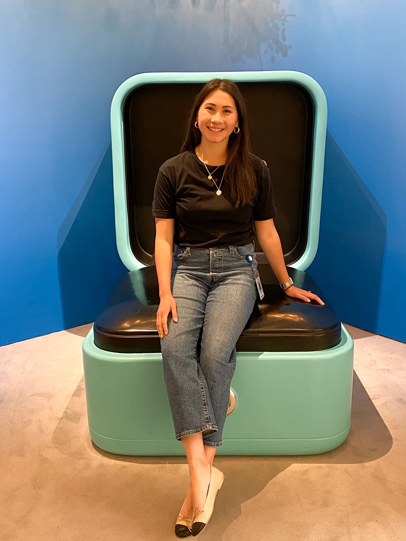 Jenny Reilly sitting on giant Tiffany & Co. ring box