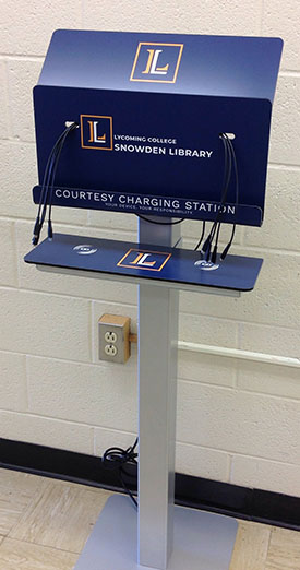 Charging station for cell phones