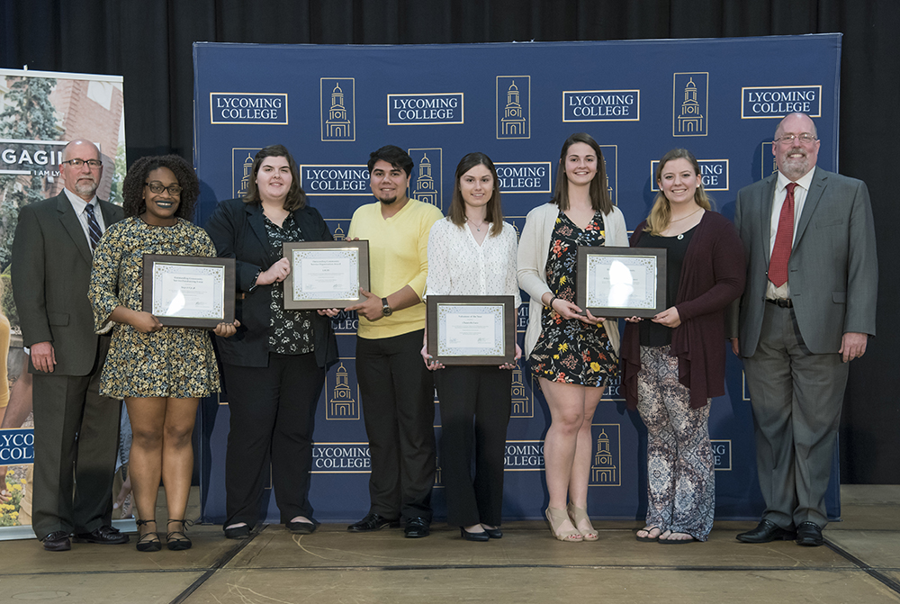 Community Service Awards (L to R): Dr. Dan Miller; Gabriella Quintard for Alpha Xi Delta; Jessica Hoff and Brandan Gracia for LACES; Chantelle Lutz, Volunteer of the Year Award; Jena Hampton and Jenn Crider for Colleges Against Cancer; and Rev. Jeff LeCrone.