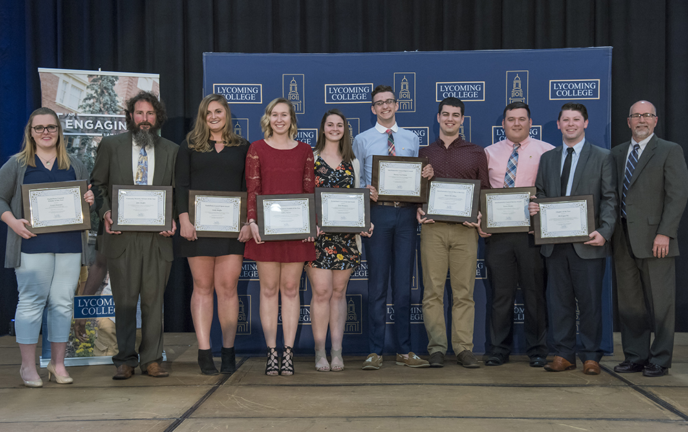 Fraternity and Sorority Life Awards (L to R): Coral Chiaretti (Panhellenic Scholar), John Shaffer (Chapter Advisor), Emily Shaffer (Panhellenic Spirit), Ashley Stover (Woman of the Year), Jena Hampton (Panhellenic Service), Thomas Van Patten (Interfraternity Council Spirit), Shawn McCollum (Man of the Year), Trevor Heisler (Interfraternity Council Scholar), Matt Bernard (representing Phi Kappa Psi for chapter of the year), Dr. Dan Miller