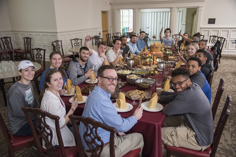 Cullen Chandler, Ph.D., with Lycoming College students during their final feast in his “Medieval Food and Culture” course, Spring 2017