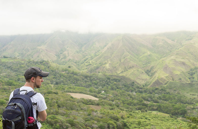 Alex Dvorshock contemplates the view from the beautiful mountains of El Naranjito. 