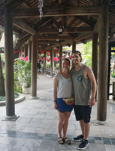 Students Jake Merkel and Kelly Pankowski in Hoi An. The lotus decorations are in honor of Buddha’s birthday.