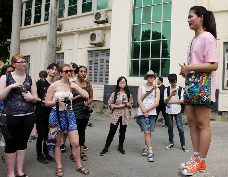 Students listening to a Vietnamese student guide at Hanoi University before pairing with a Vietnamese student to learn more about the country’s higher education system and student life in Hanoi.