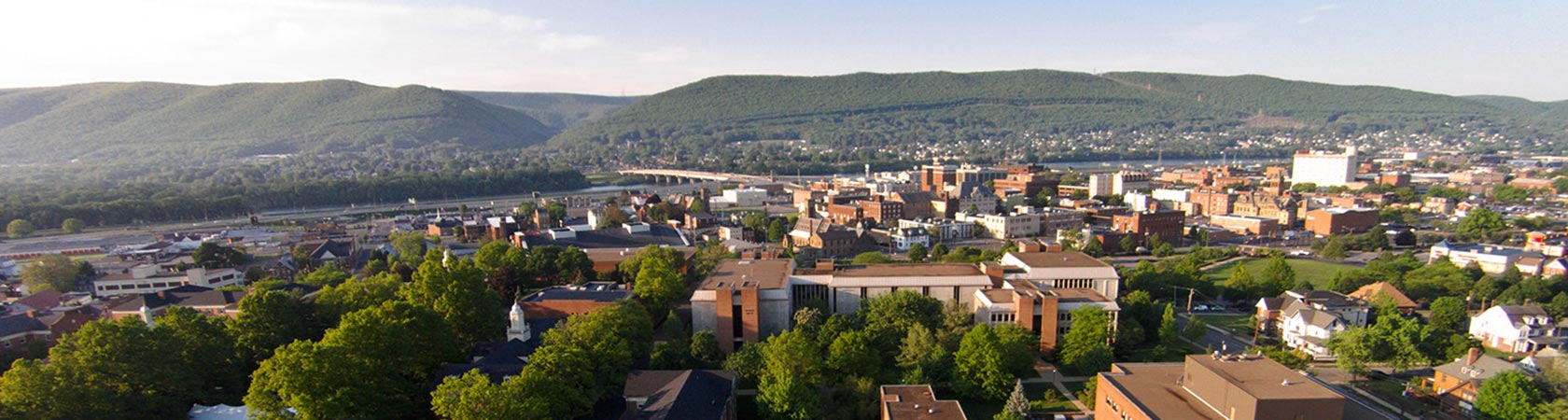 Aerial view of campus with Williamsport, the Susquehanna River and Bald Eagle Mountain as a backdrop